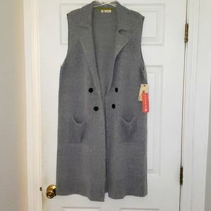 Sleeveless long vest w/ buttons and pockets